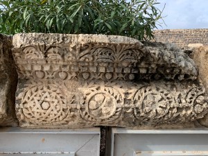 Decorative stone with carvings of pomegranates, flowers and star of David