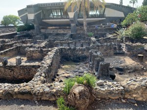 Modern disc-shaped church built over the remains of the residential area of Capernaum